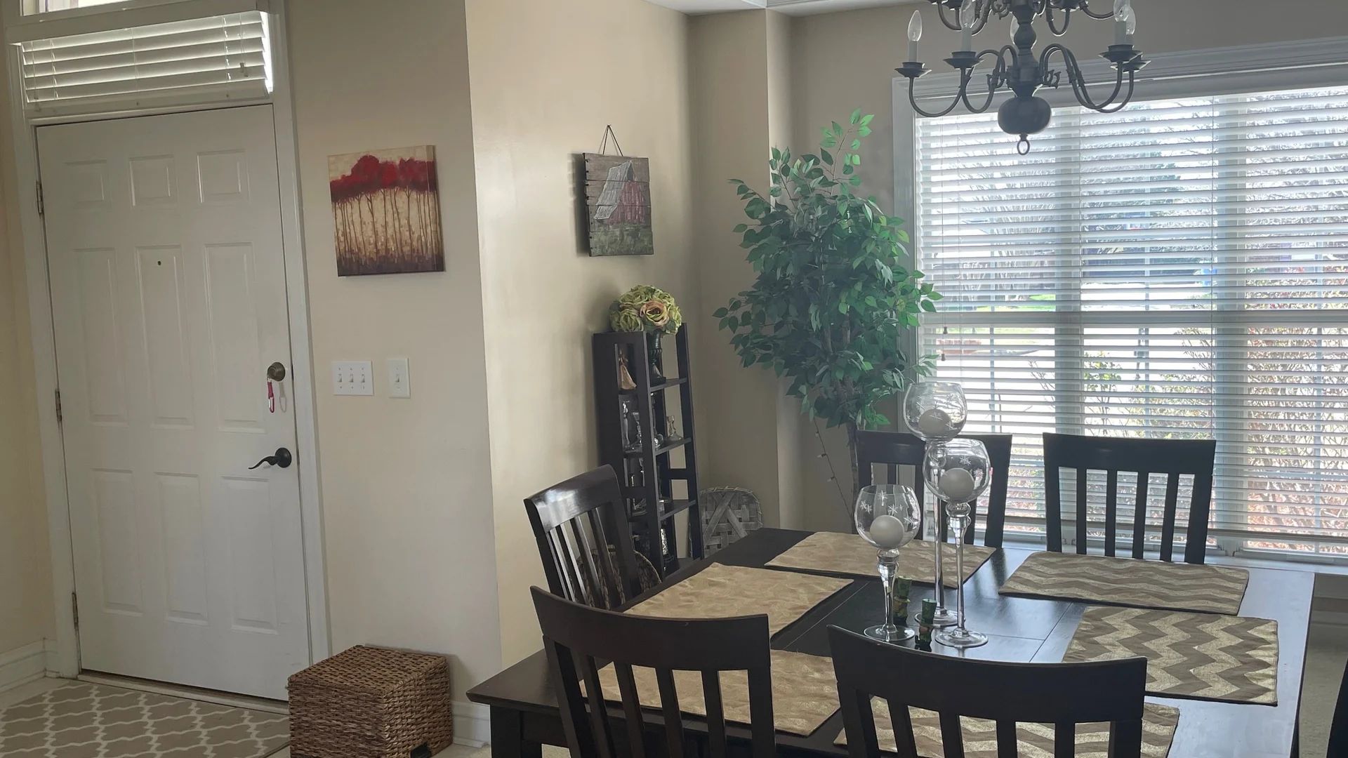 Light painted dining room with white trim